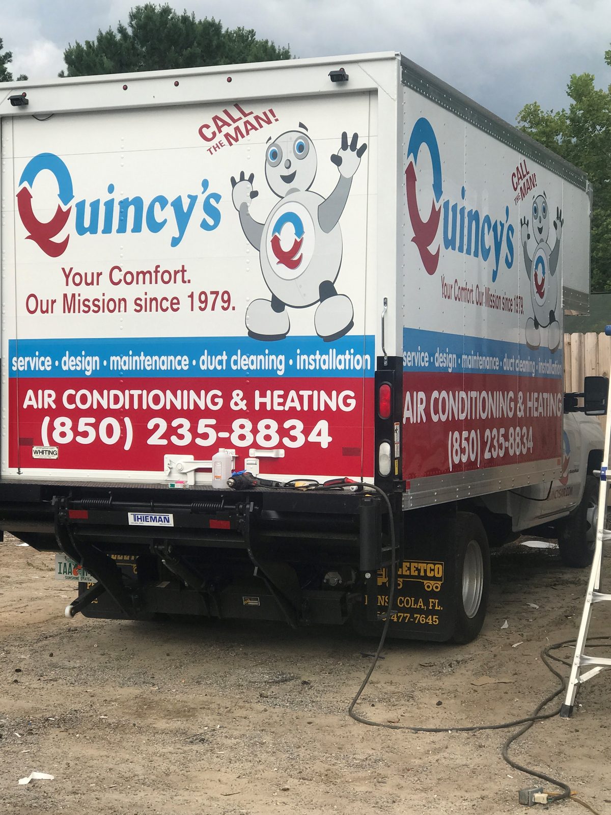 Quincy's Heating and Air service truck on a call in Bay County, Florida